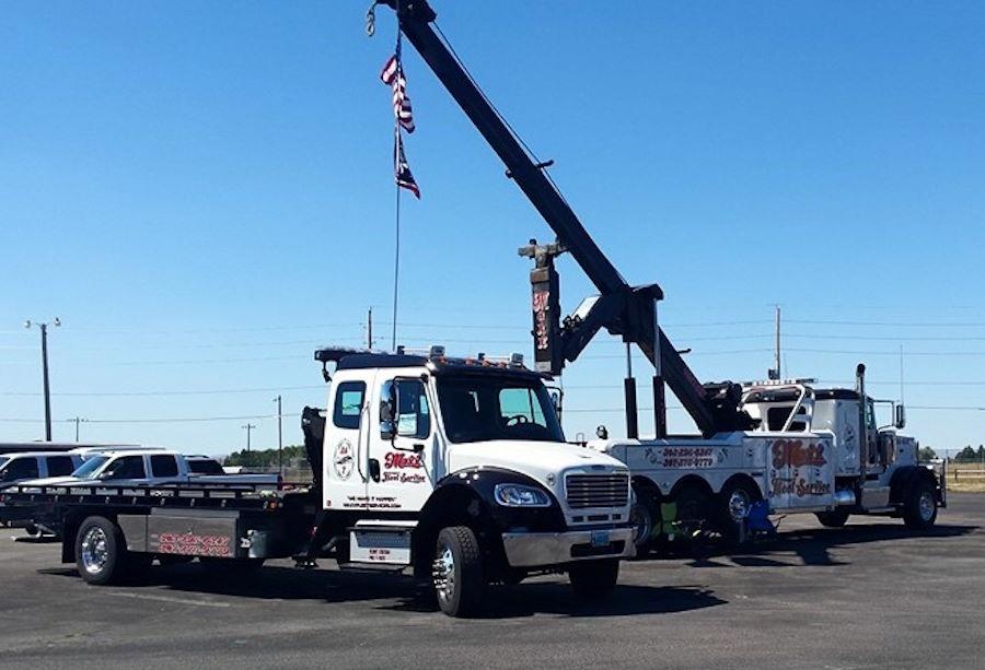 Two of Maxx Fleet's heavy duty tow trucks